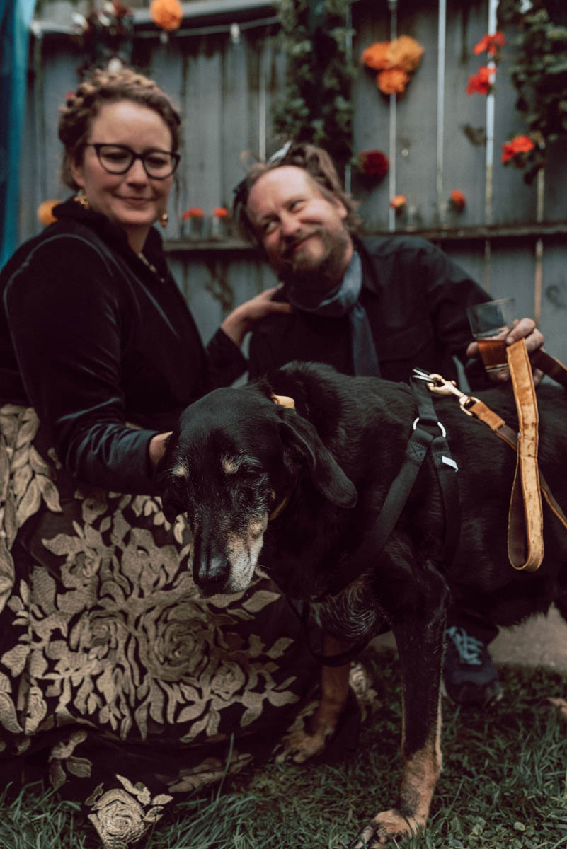 Bessie the big black dog and her humans after they said I do